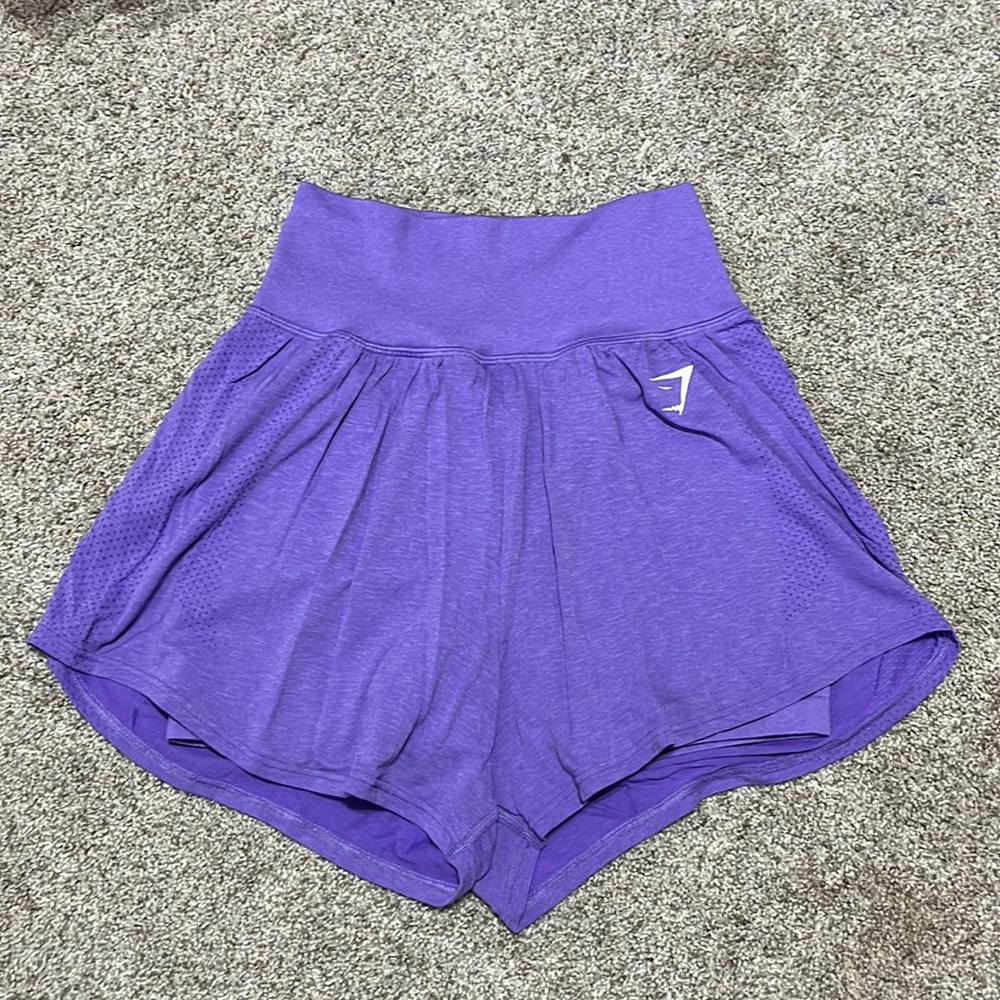 Women’s Gymshark purple compression shorts lined high waisted shorts. Size small